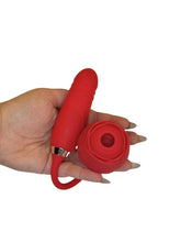 Red silicone product held in a hand against a white background