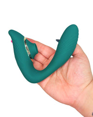 Teal hand personal massager adult toy in a hand on a white background