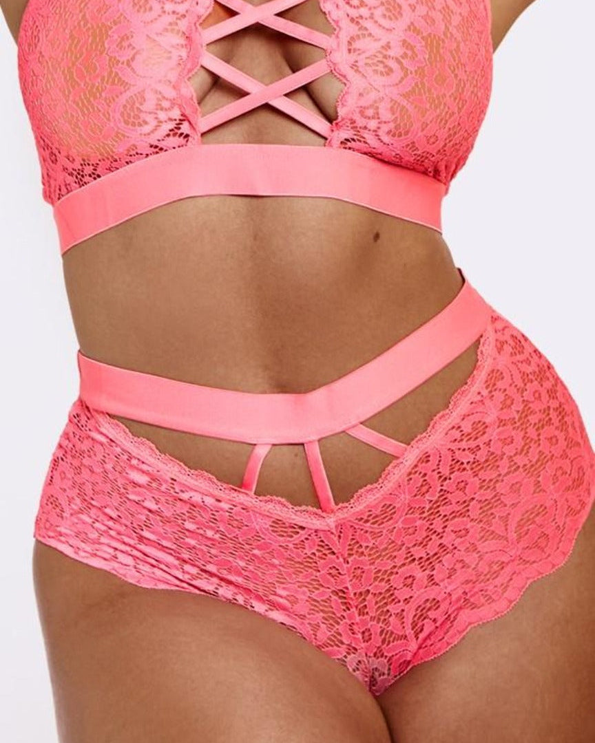 A rose pink lace Brazilian brief with a high waistband and cheeky caging detail.