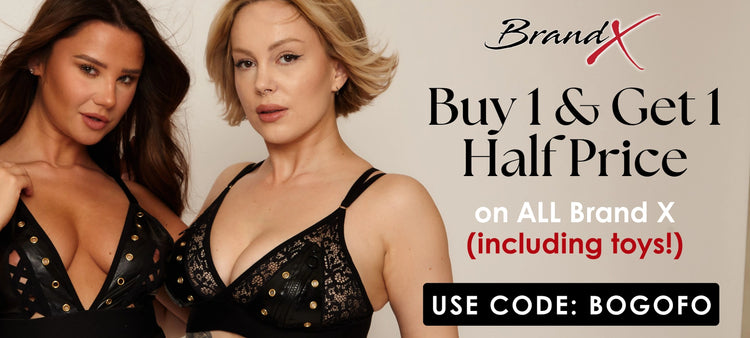 Two women wearing black lingerie standing side by side next to a Brand X promo graphic that reads “Buy 1 & Get 1 Half Price on all Brand X (including toys!) Use code: BOGOFO.