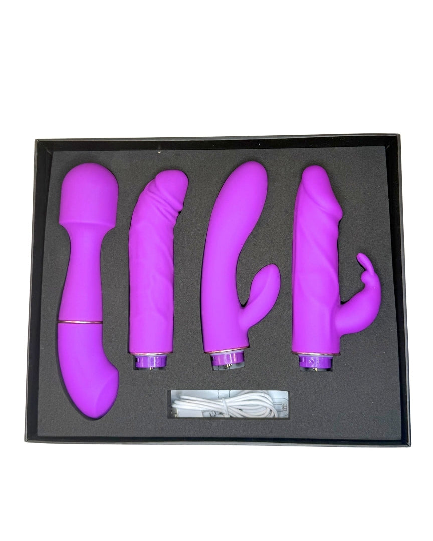 Set of purple sex toys in a black box on a white background